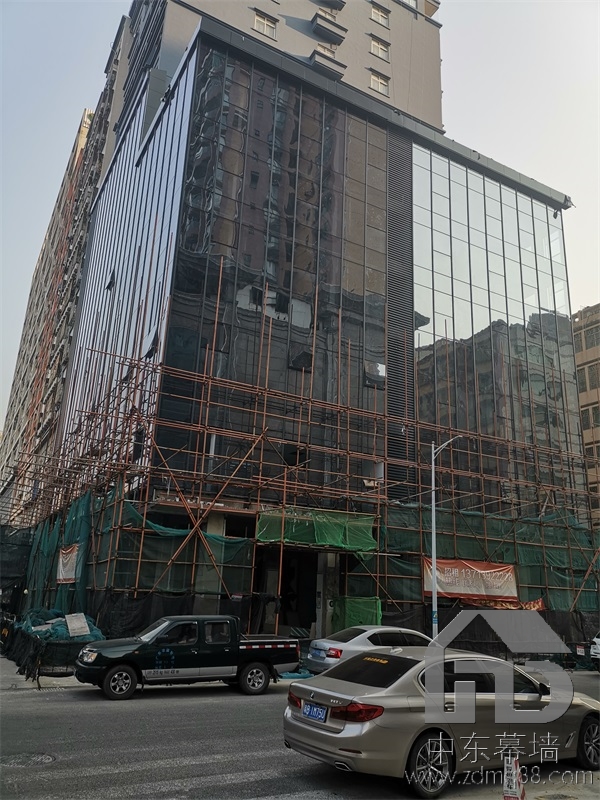 為什么現(xiàn)代建筑用玻璃幕墻？